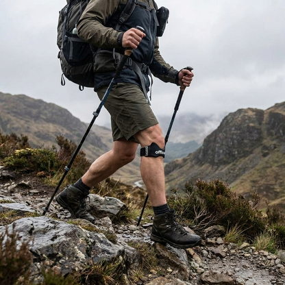 Hiker wearing the offload. knee strap on a steep rocky descent