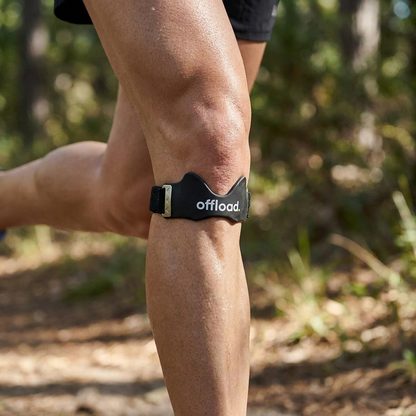 offload. knee strap worn while running, staying in place